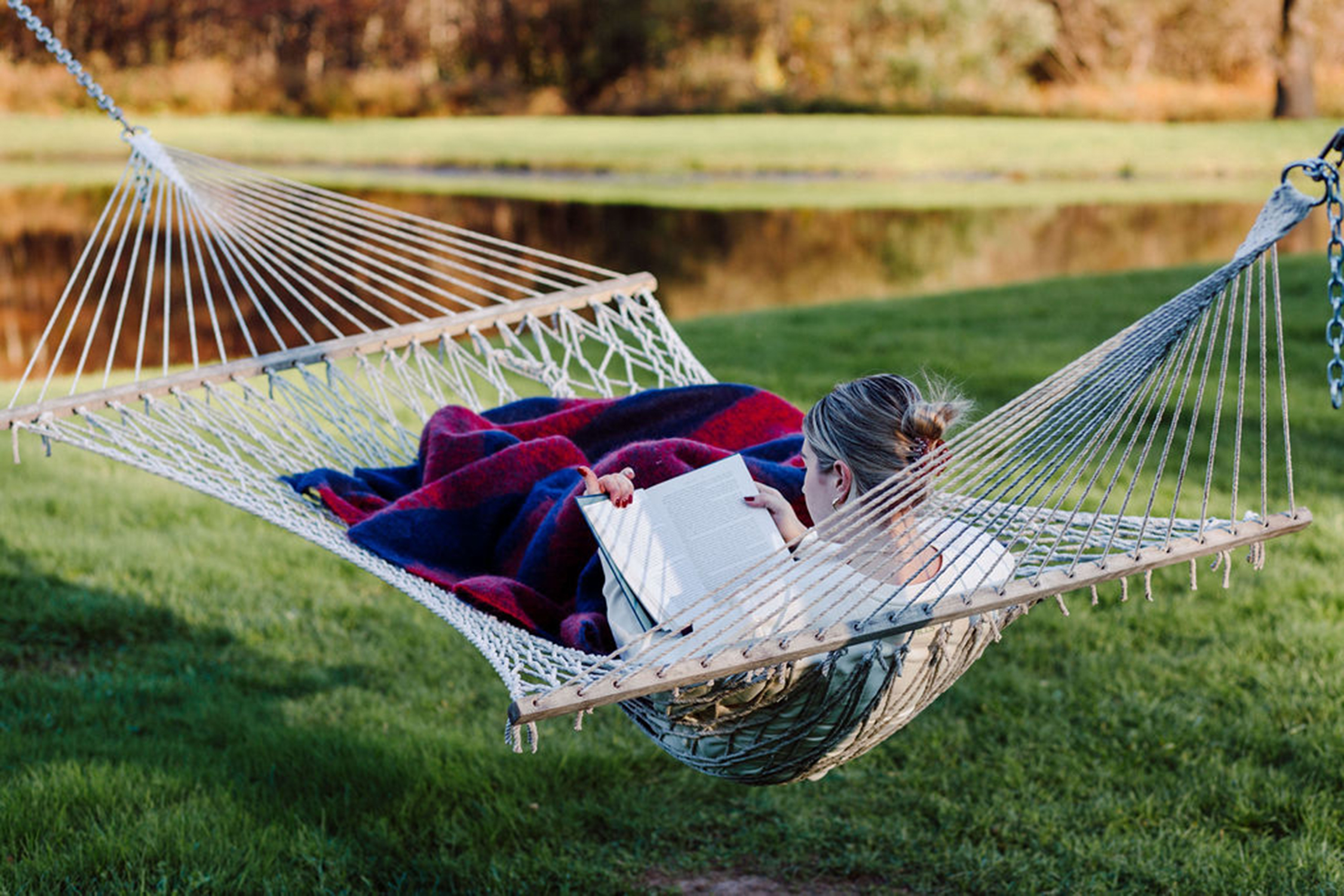 woman reading in hamock